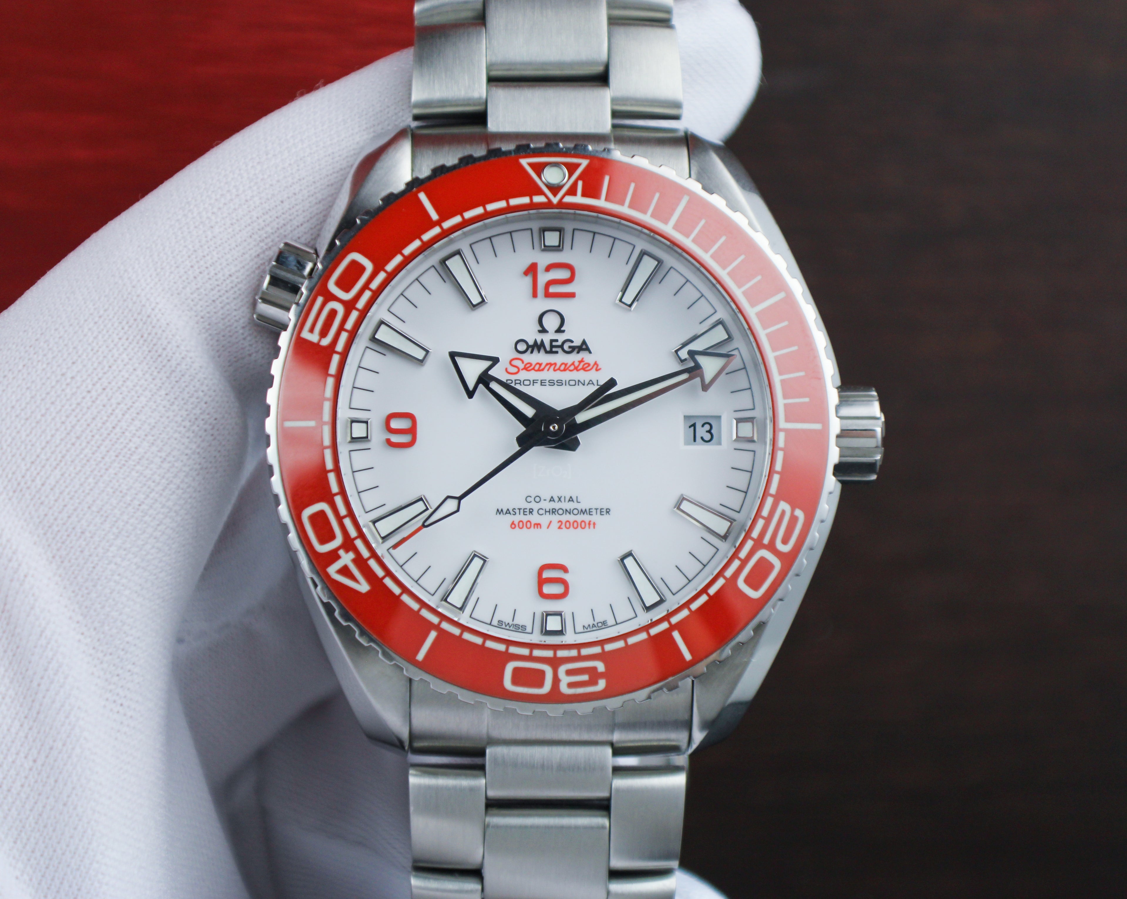 Omega Seamaster Planet Ocean 600M 215.30.44.21.04.001 “Creamsicle” White Dial Orange Bezel