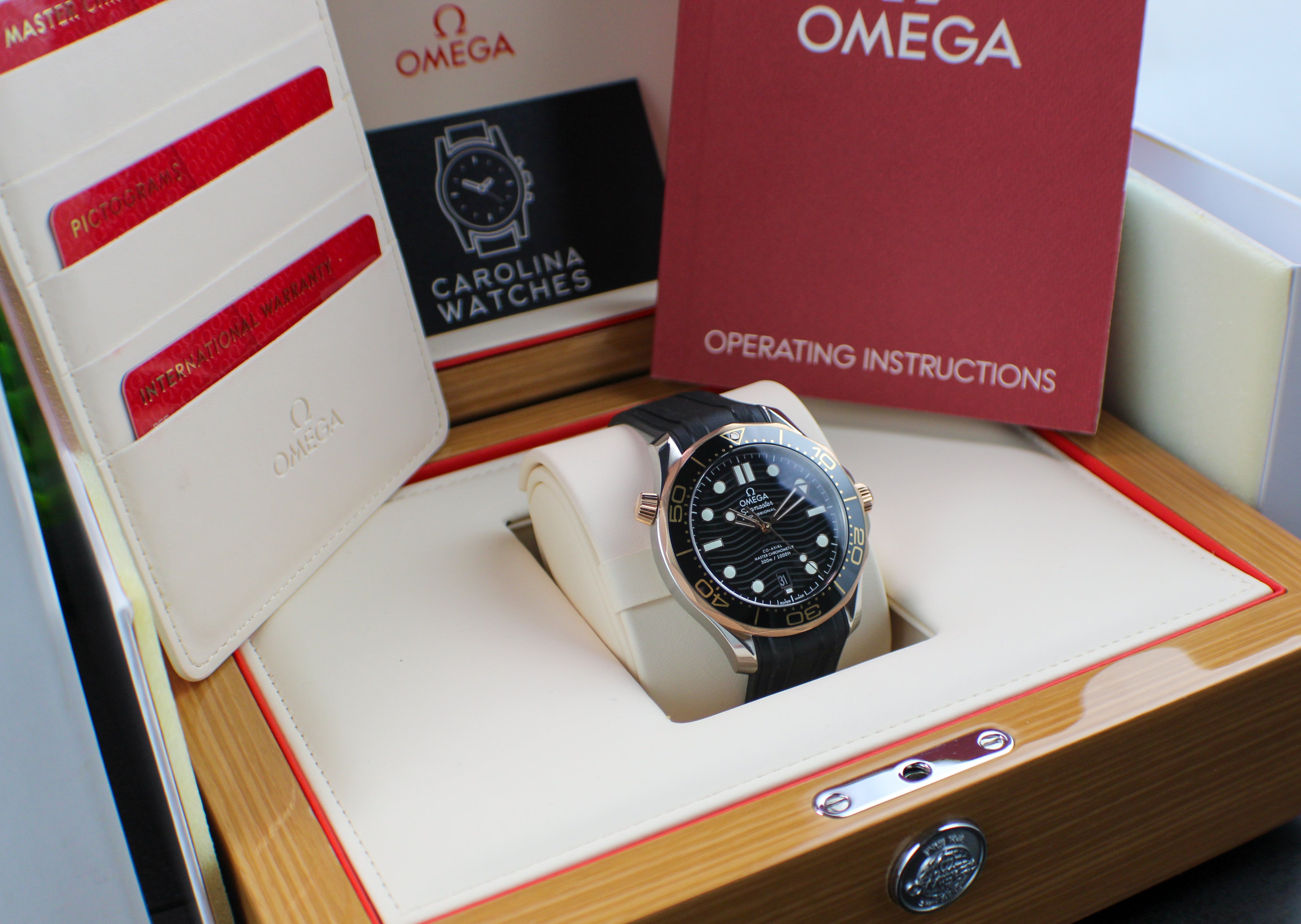 Omega Seamaster Diver 300M 210.22.42.20.01.002 18K Sedna Gold Bezel Box & Papers