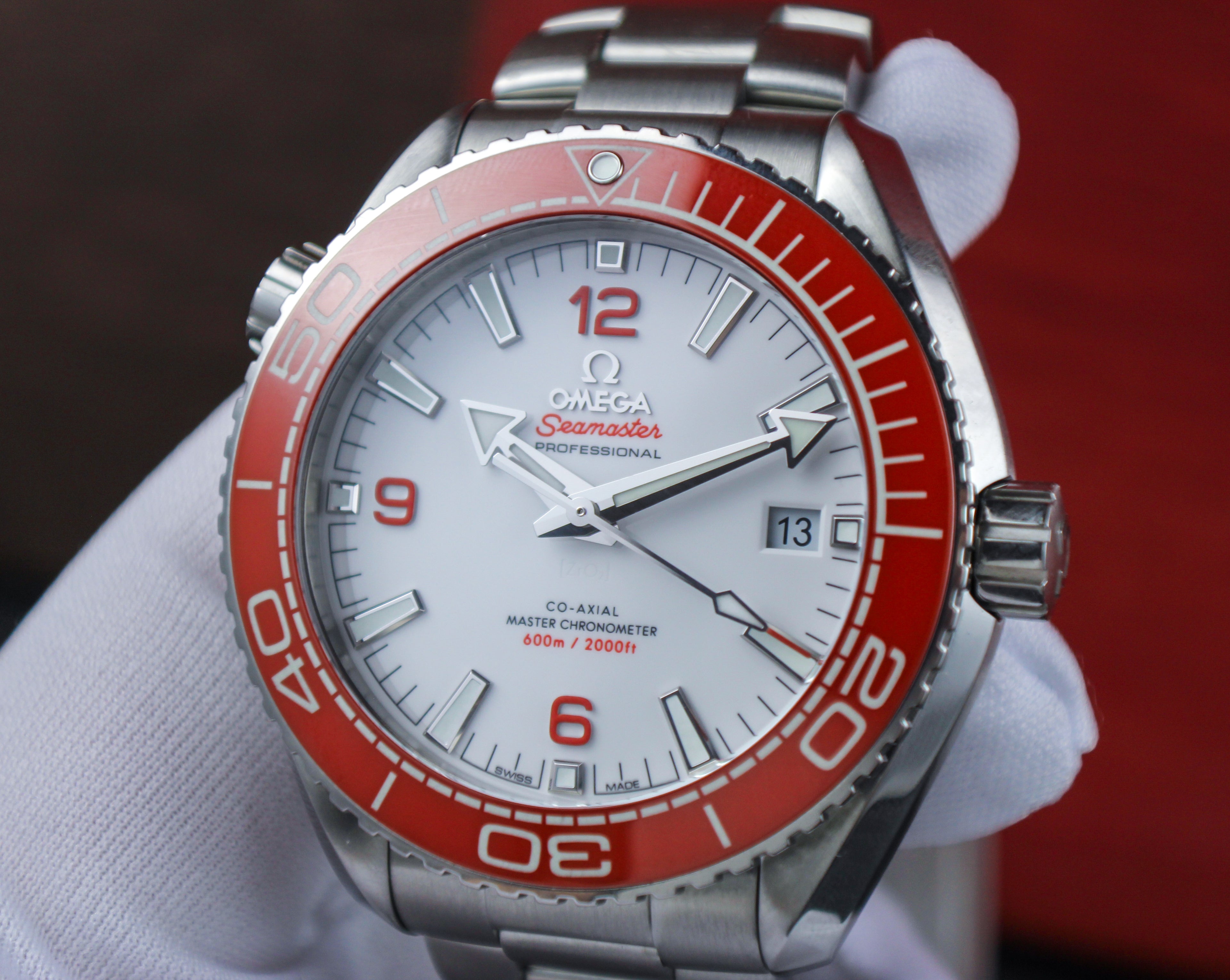 Omega Seamaster Planet Ocean 600M 215.30.44.21.04.001 “Creamsicle” White Dial Orange Bezel