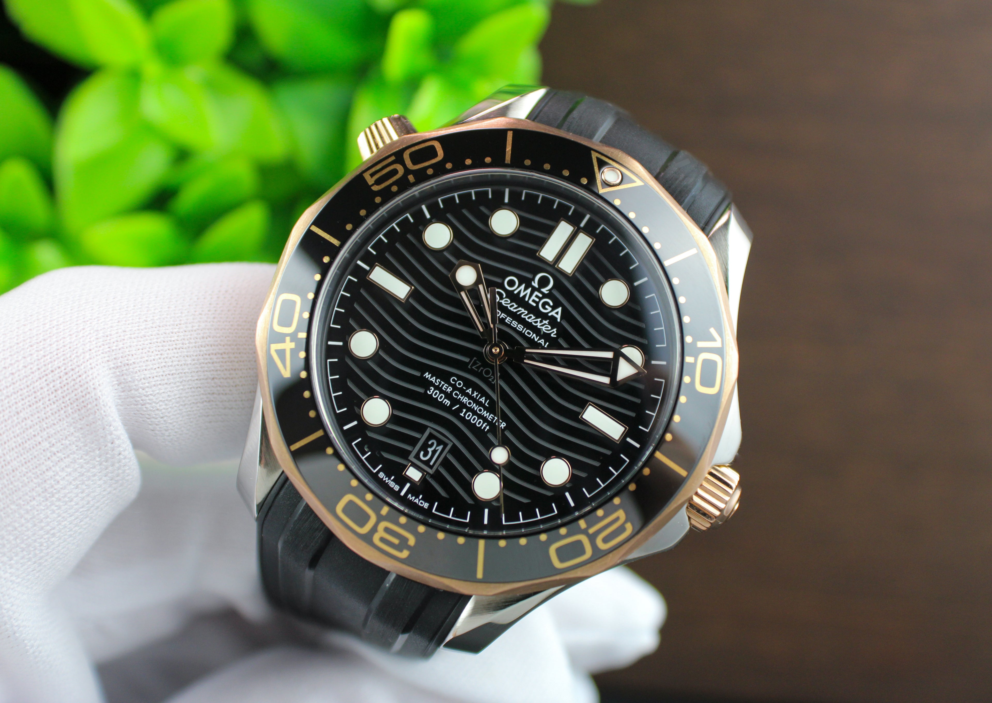 Omega Seamaster Diver 300M 210.22.42.20.01.002 18K Sedna Gold Bezel Box & Papers