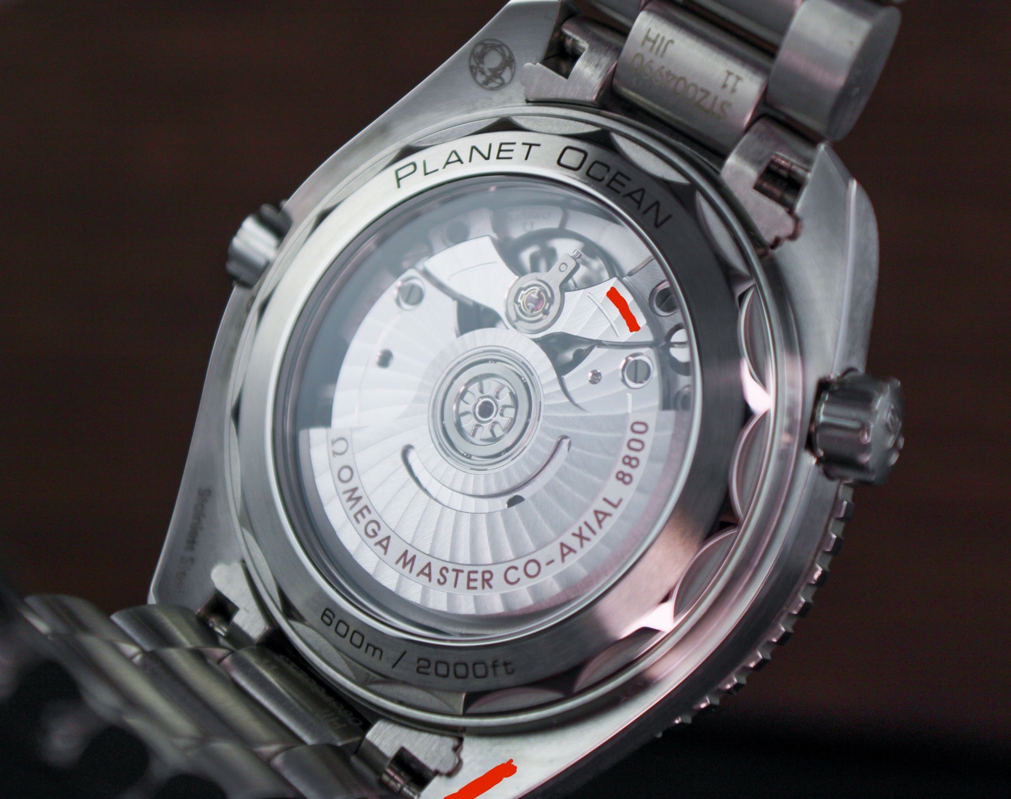 OMEGA Seamaster Planet Ocean 600M 215.30.40.20.04.001 White Dial Ceramic