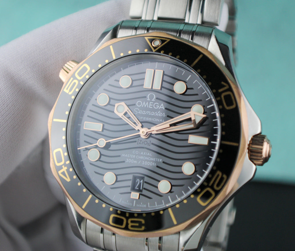 OMEGA Seamaster Diver 300M 210.22.42.20.01.002 18K Sedna Gold Bezel Steel Band