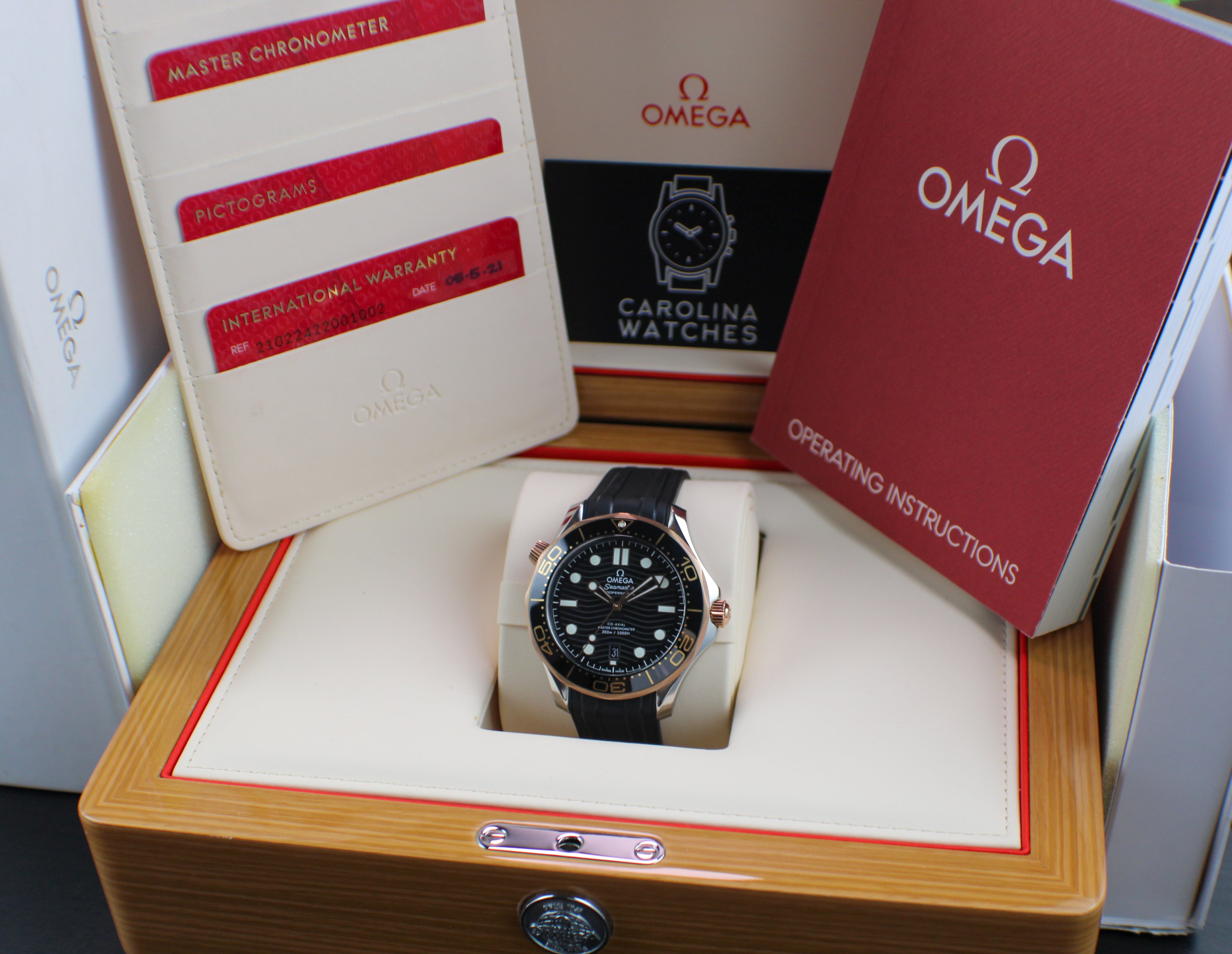 Omega Seamaster Diver 300M 210.22.42.20.01.002 18K Sedna Gold Bezel Box & Papers
