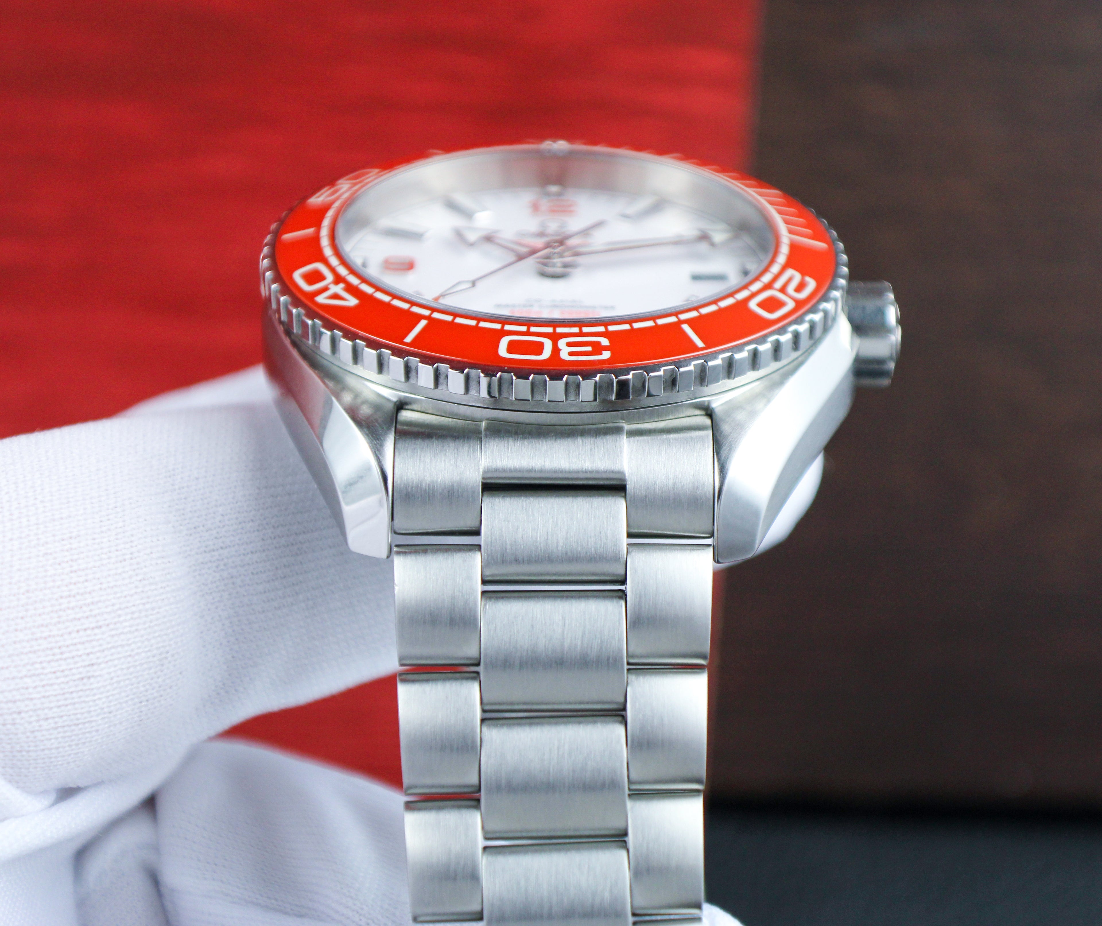 Omega Seamaster Planet Ocean 600M 215.30.44.21.04.001 “Creamsicle” White Dial Orange Bezel