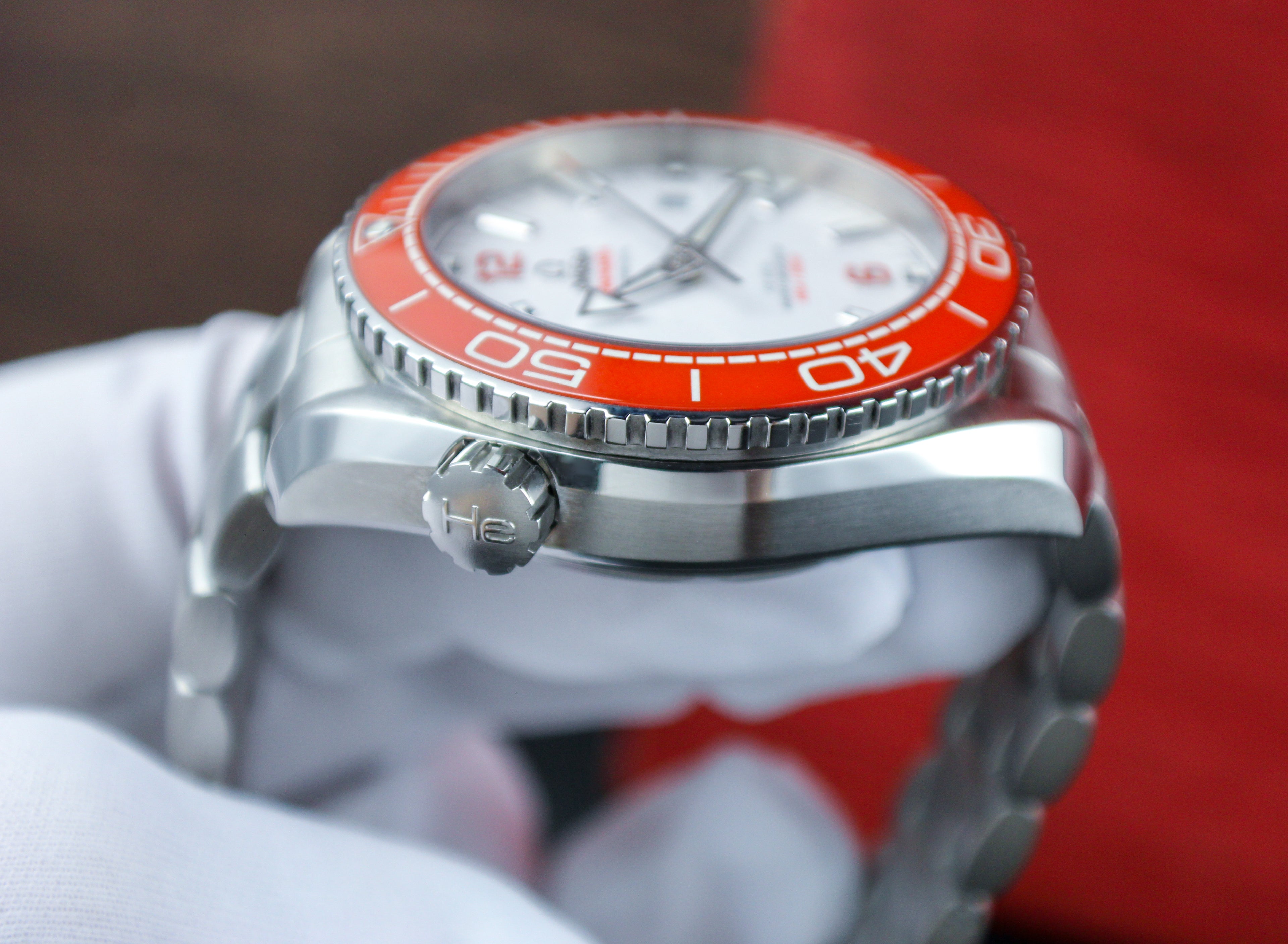 Omega Seamaster Planet Ocean 600M 215.30.44.21.04.001 “Creamsicle” White Dial Orange Bezel