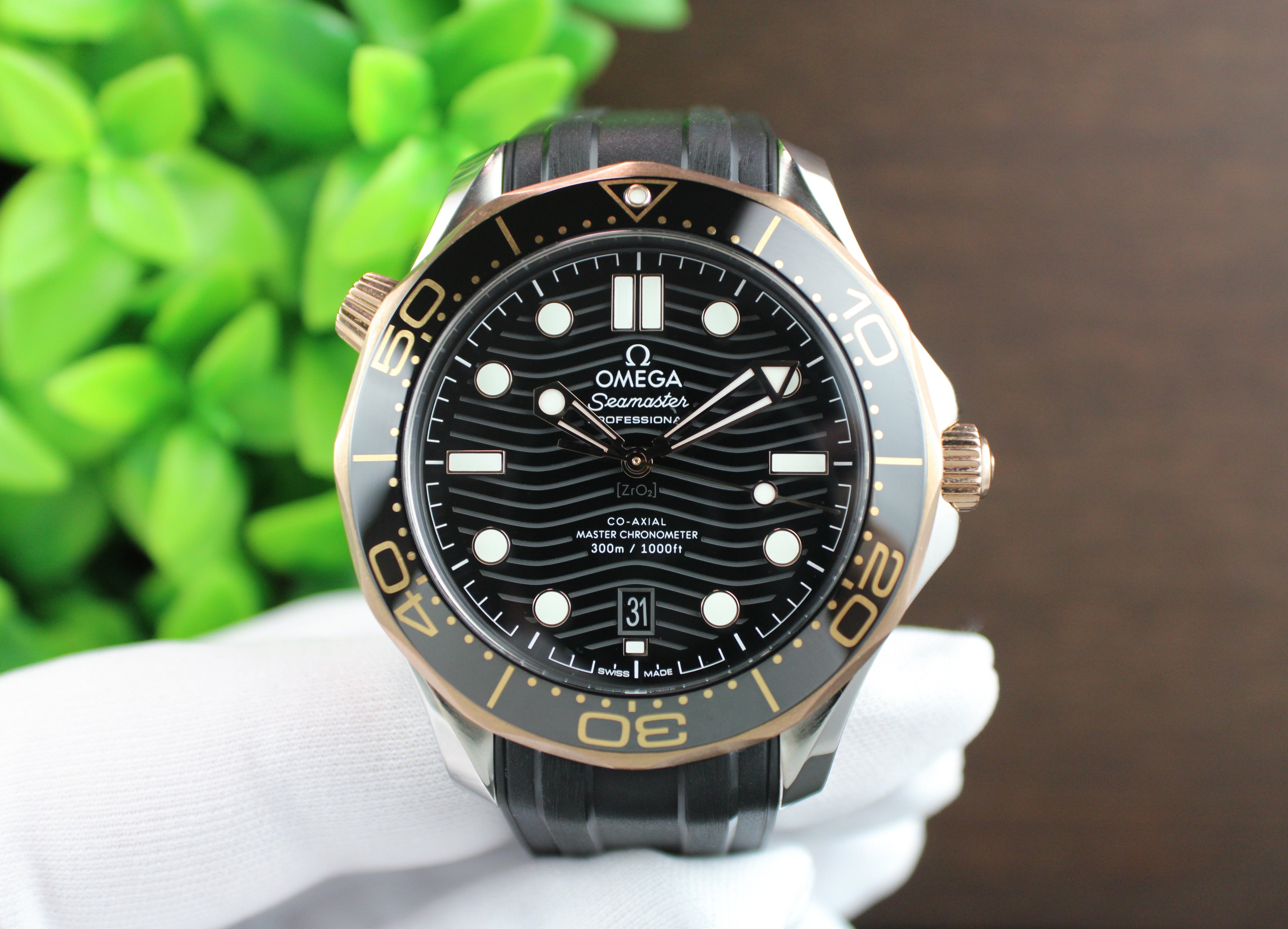 Omega Seamaster Diver 300M 210.22.42.20.01.002 18K Sedna Gold Bezel Box & Papers