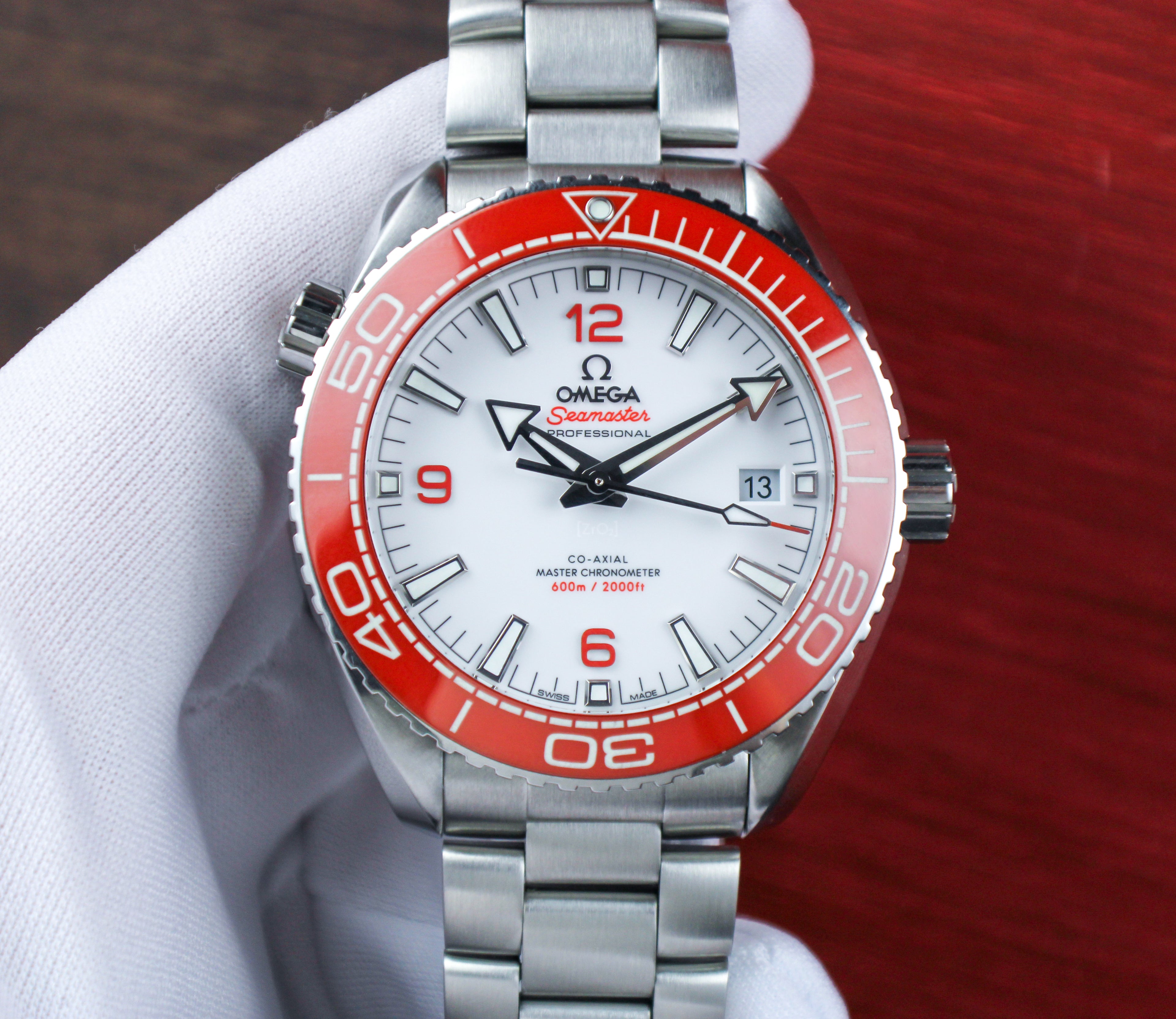 Omega Seamaster Planet Ocean 600M 215.30.44.21.04.001 “Creamsicle” White Dial Orange Bezel