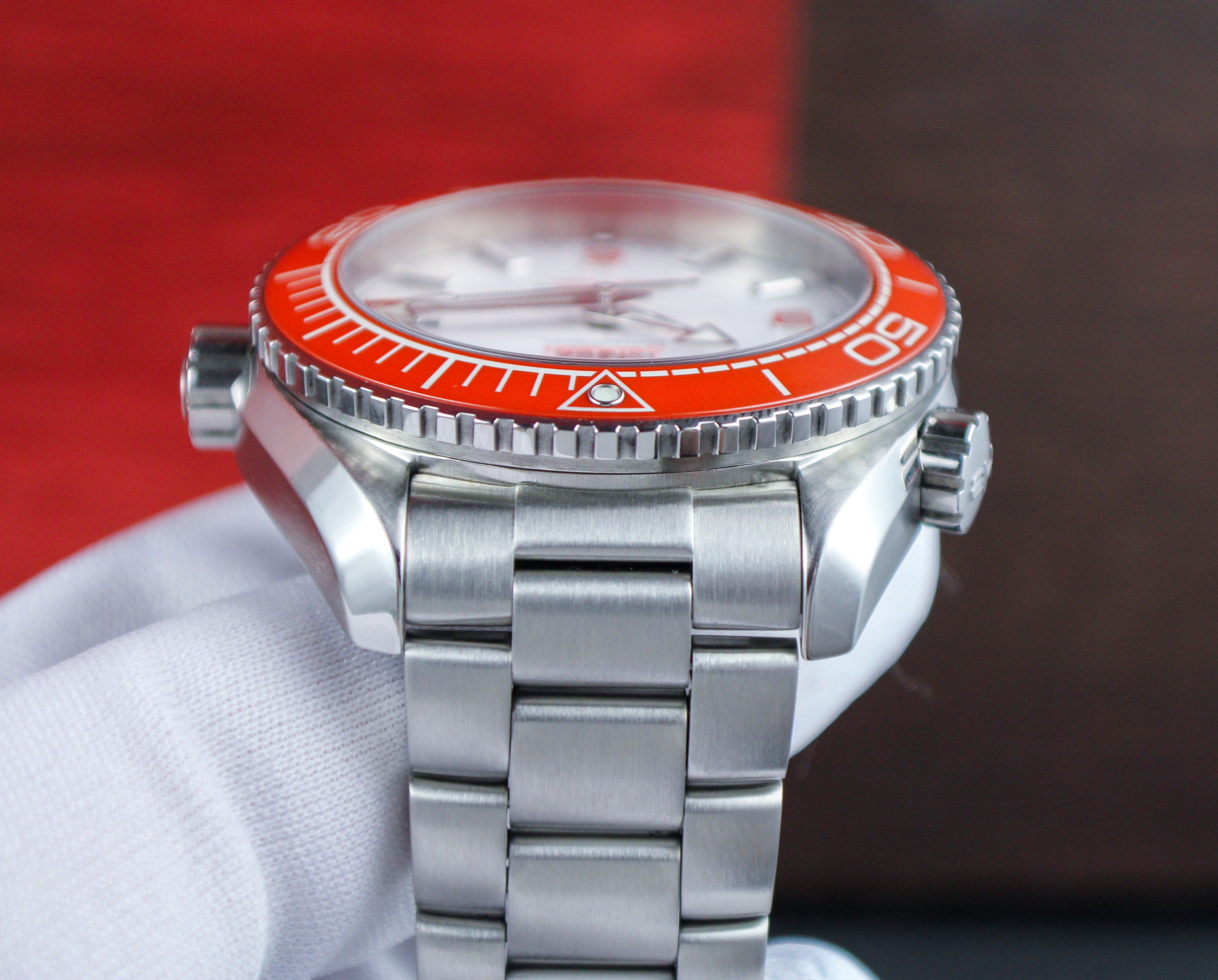 Omega Seamaster Planet Ocean 600M 215.30.44.21.04.001 “Creamsicle” White Dial Orange Bezel