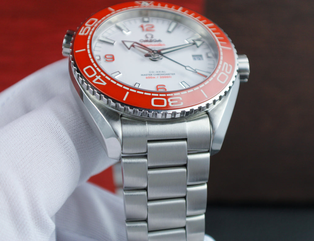 Omega Seamaster Planet Ocean 600M 215.30.44.21.04.001 “Creamsicle” White Dial Orange Bezel