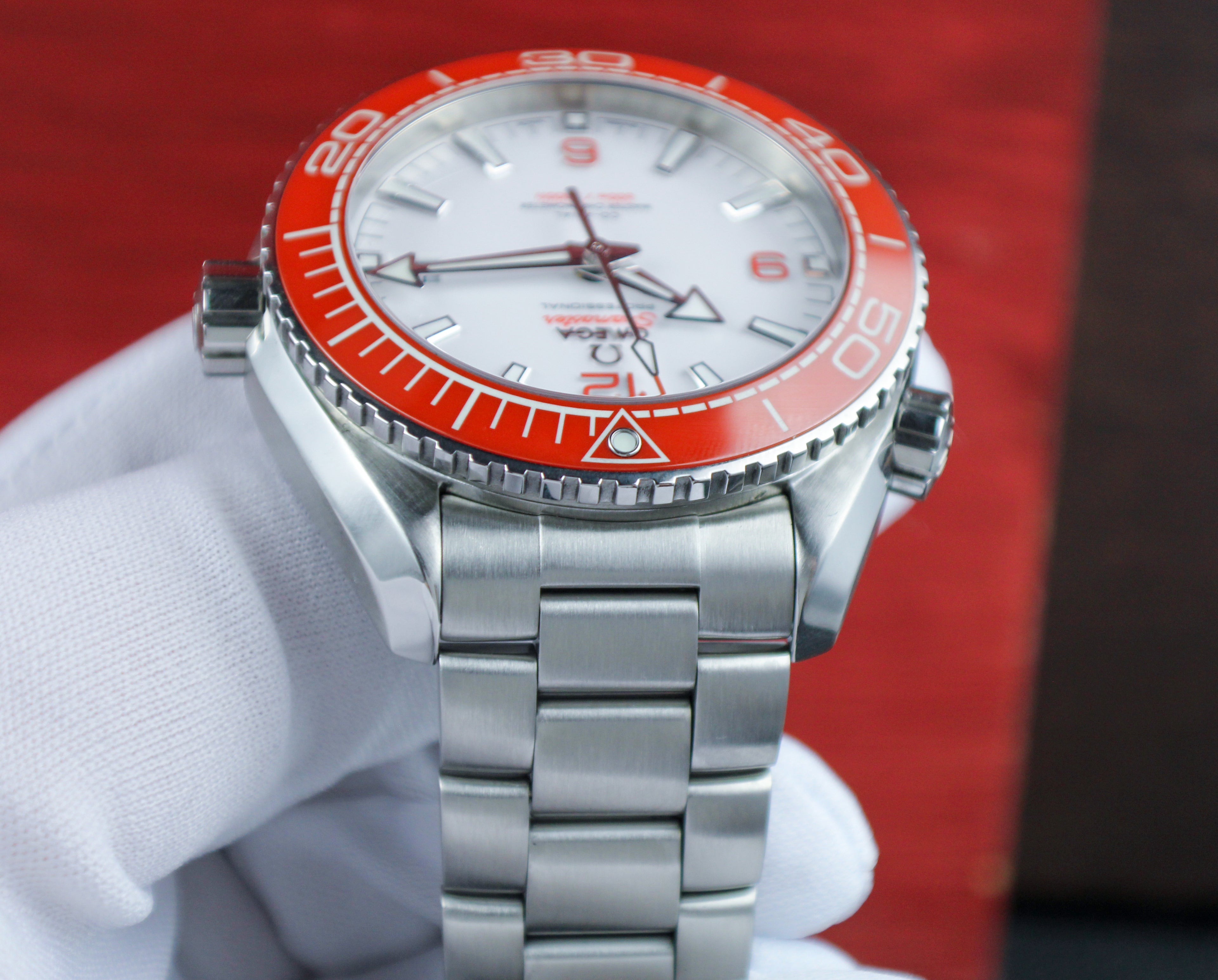 Omega Seamaster Planet Ocean 600M 215.30.44.21.04.001 “Creamsicle” White Dial Orange Bezel